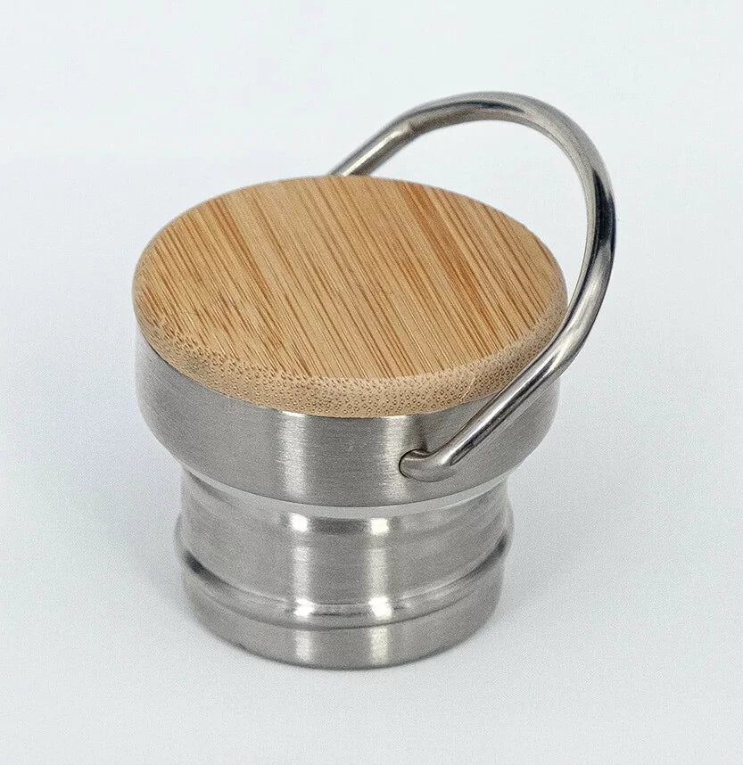 Bamboo insert on bottle lid